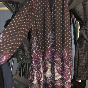 Dress with sleeves and shoulder cut outs